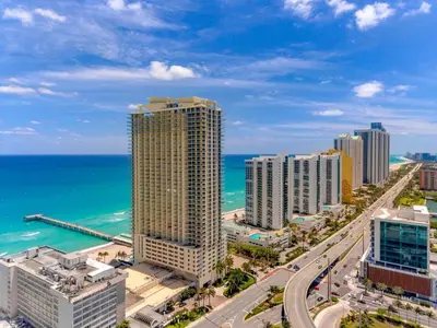 a view of a city with the ocean and buildings at Beach Vibes & 30th Floor Ocean Views in Sunny Isles Beach