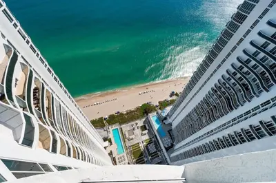 a view of the beach from a cruise ship at Sophisticated Modern Gem with Unreal Ocean Views in Sunny Isles Beach