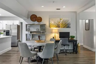 a kitchen and dining room with a table and chairs at Luxurious Hollywood Retreat Perfect Getaway in Hollywood