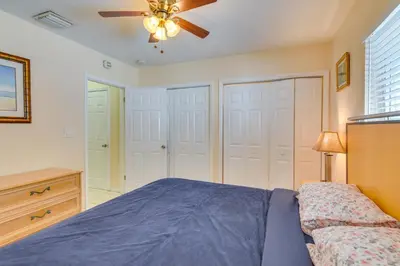 a bedroom with a bed and a ceiling fan at Pet-Friendly Hallandale Beach Condo Near Boardwalk in Hallandale Beach
