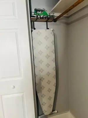 a tie hanging on a rack in a room at Private Double Room Near Miami Clinics in Miami