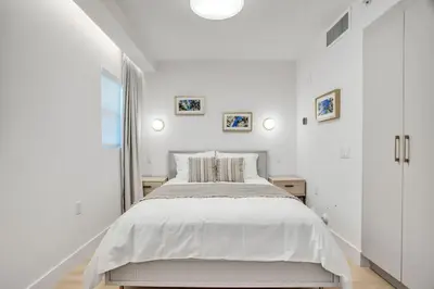 a white bedroom with a large bed in it at Vonder Miami Beach - Unit 2 in Miami Beach