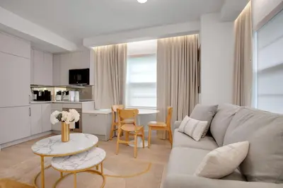 a living room with a couch and a table at Vonder Miami Beach - Unit 10 in Miami Beach