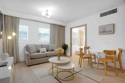 a living room with a couch and a table at Vonder Miami Beach - Unit 17 in Miami Beach