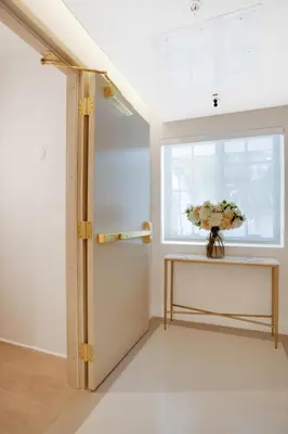 a room with a window and a vase of flowers on a table at Vonder Miami Beach - Unit 19 in Miami Beach