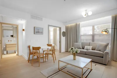 a living room with a couch and a table at Vonder Miami Beach - Unit 19 in Miami Beach