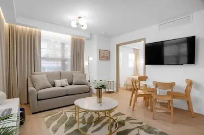 a living room with a couch and a table at Vonder Miami Beach - Unit 20 in Miami Beach