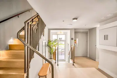 a staircase in a house with a plant at Vonder Miami Beach - Unit 20 in Miami Beach