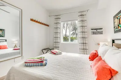 a bedroom with a mirror and a bed at Cozy Miami Beach Apartment Less Than 1 Mi to Ocean! in Miami Beach