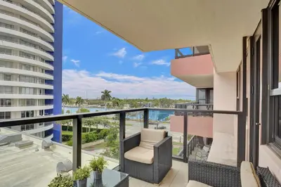 a balcony with a view of the ocean at Cozy Ocean View Condo Beach Service 617 in Miami Beach