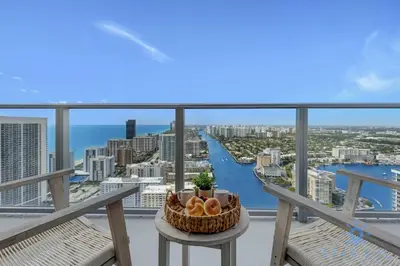 a bowl of fruit on a table on the balcony of a building at High Floor 3BR - 2BA - Resort Fees & Parking Incl in Hollywood