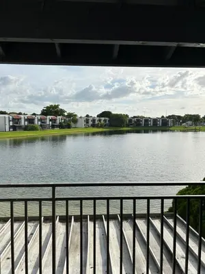 a view of a body of water from a bridge at Beautiful apartment with very elegant colonial decoration in Tamiami