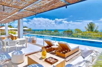 an image of a villa with a swimming pool at Romantic-5 star-1BR-Oceanfront-Balcony-South-Beach in Miami Beach