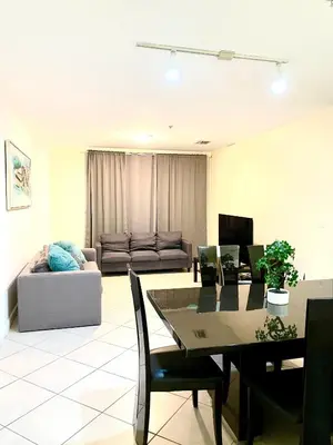 a living room with a table and a couch at Private bedroom in Miami - Coral Gables 601 in Miami