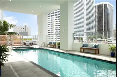a swimming pool on the roof of a building at Spacious Studio in the Heart of Downtown Miami in Miami
