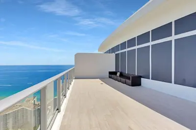 a view of the ocean from the balcony of a building at Penthouse with Free Parking and Beautiful Amenities in Hollywood