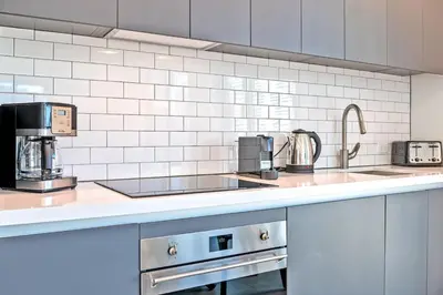 a kitchen with a counter top with a coffee maker at Gorgeous Unit in the Heart of Downtown Miami in Miami