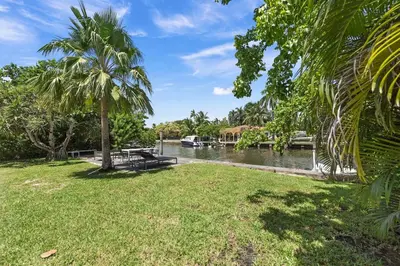 a view of the river from a park at The Waterhouse- Amazing Villa With Infinity Pool in Miami