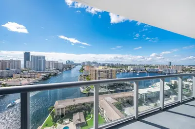 a view of a river from the balcony of a building at Beachwalk - 1 Bedroom & Kitchen Amazing Bay view in Hallandale Beach