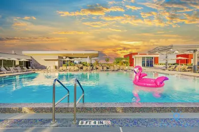 a pool with a pink rubber duck in the water at Beautiful Apt 2BR Hollywood Beach Rooftop Pool in Hollywood