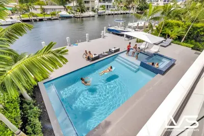 an overhead view of a swimming pool on a yacht at Carlotta- New Construction Luxury Waterfront Villa in Fort Lauderdale