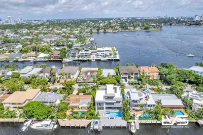 an aerial view of a harbor with houses and condos at Carlotta- New Construction Luxury Waterfront Villa in Fort Lauderdale