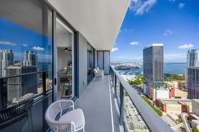 an apartment balcony with views of the city at Upscale 1-BD Condo with Stunning City Views in Miami