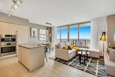 a kitchen and living room with a couch and a table at 1BR Apartment - Near Beach - Amazing pool in Hollywood