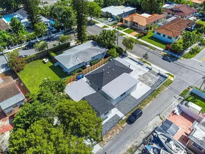 an overhead view of a house in a city at Modern Oasis Unit 2 - Close to Beach, Brickell & Airport in Miami