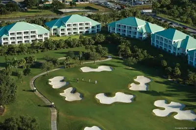 an overhead view of a golf course at a resort at Doral Pool 310 by WaveProperties in Miami
