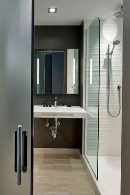 a bathroom with a sink and a shower at AC Hotel by Marriott Miami Beach in Miami Beach