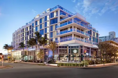 a rendering of a building on a city street at AC Hotel by Marriott Miami Beach in Miami Beach