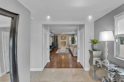 a hallway of a home with white walls at Ft Lauderdale Casa de Las Olas in Fort Lauderdale