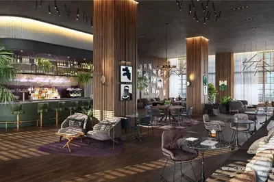 a lobby with a bar with chairs and tables at 2 bedroom Condo at Gale Downtown Pool Gym SPA in Miami