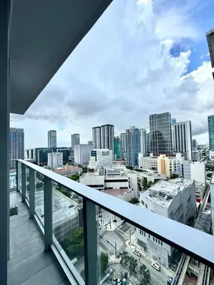 a view of a city skyline from a balcony at 2 bedrooms Design Condo Downtown Miami Pool and Gym in Miami