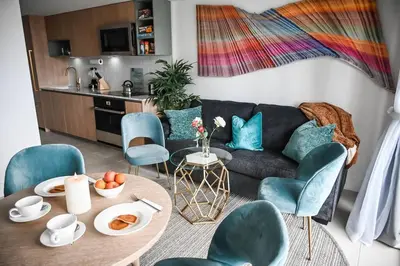 a living room with a couch and a table at Miami Luxury 27th Floor, Best Waterfront Balcony View & City Lights, Pool,Gym,Spa in Miami