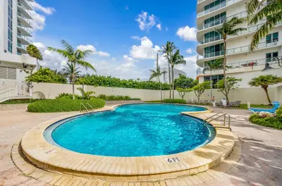 a swimming pool in the middle of a building at Oceanfront Luxury Condo with Stunning Views and Resort Amenities in Hollywood