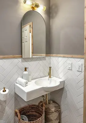 a white bathroom with a sink and a mirror at Imagine Residence in Hallandale Beach