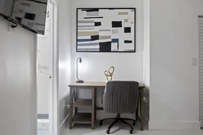 a home office with a desk and a chair at Nice,Stylish King Bed Studio in Miami Gardens