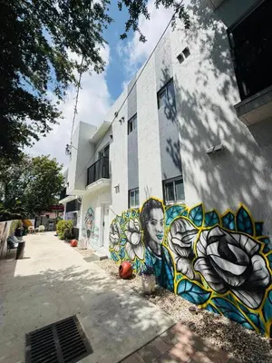 a building with graffiti on the side of it at Miami Design District in Miami