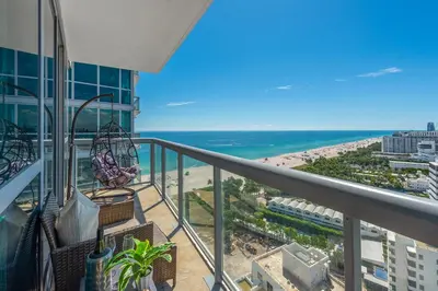 a balcony with a view of the beach at Oceanview Private Condo at The Setai -2604 in Miami Beach