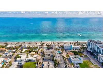 an aerial view of the beach and the ocean at Seaside Serenity Hollywood Studio Escape in Hollywood