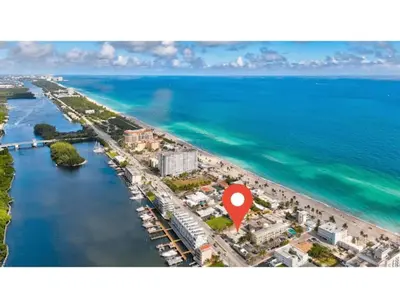 an aerial view of a beach with a red marker at Studio Oasis near Hollywood Boardwalk in Hollywood