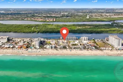 an aerial view of a beach with a red marker at Hollywood Beach Escapade Studio with Free Parking in Hollywood