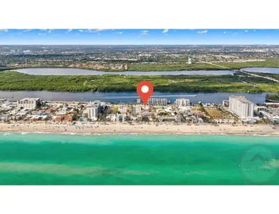 an aerial view of a beach with a red marker at Sunny Serenity Hollywood Studio Getaway in Hollywood