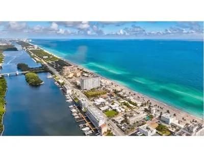an aerial view of a beach and the ocean at Beachside Bliss Hollywood Studio in Hollywood