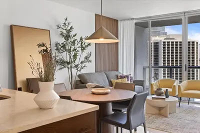 a living room with a table and a couch at Large Suites in Hotel W with bay views in Miami