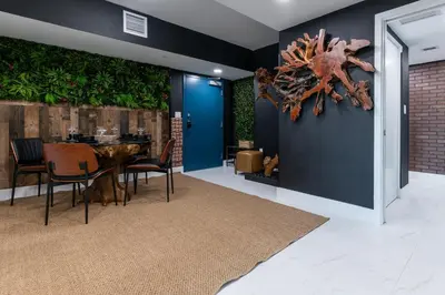 a dining room with a table and chairs at MIAMI WOOD APART HOTEL NEW 2024 - PRIVATE TERRACE - free GARAGE - Beach 5 min in Hollywood
