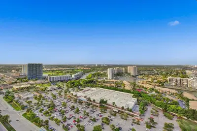 an aerial view of a parking lot in a city at Penthouse Sky Suite - 2BDR2BTH - Private Rooftop Terrace in Hallandale Beach