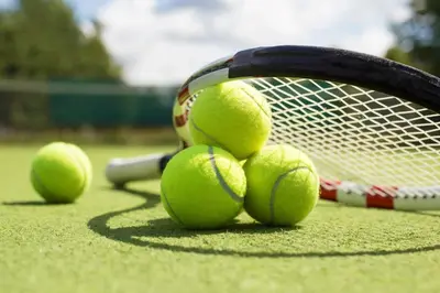 a bunch of tennis balls on a tennis racket at Oceanfront 3B Private Residence at South Beach - 828 in Miami Beach